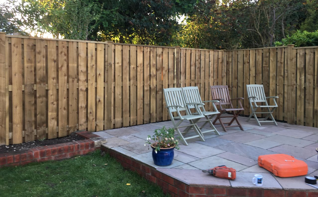 A new fence installed in a garden